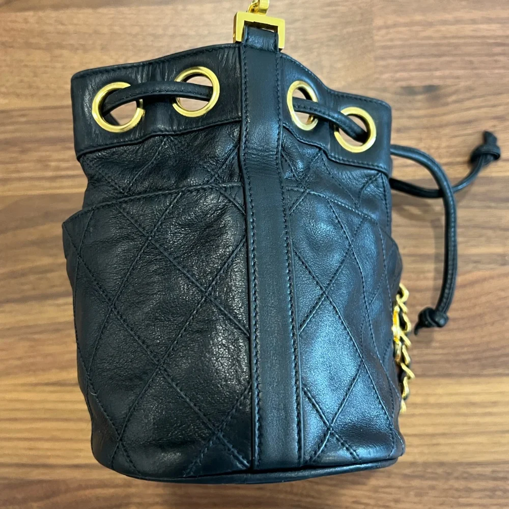 CHANEL Black Quilted Leather Drawstring Bucket Bag with Gold Hardware